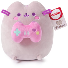 GUND Pusheen shown on a desk for gaming decor and smiles