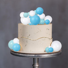 Gyufise mixed-color ball toppers create a layered dessert display.