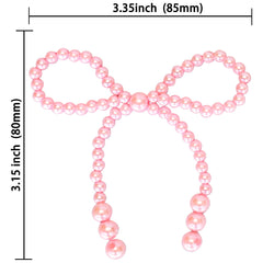 Close-up of Gyufise Pearl Bow Cake Toppers showing glossy pearl detail