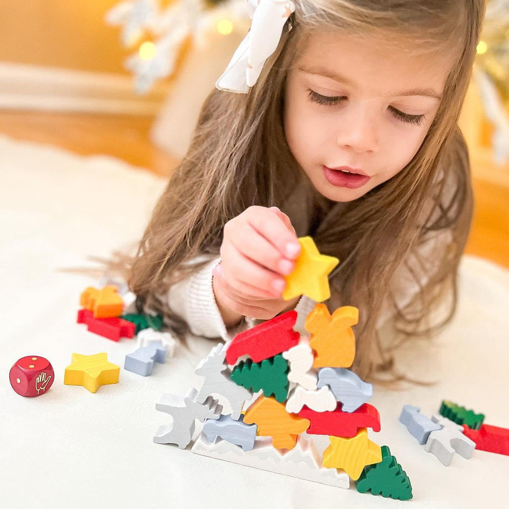 HABA Animal Upon Animal Christmas sleds, reindeer, and squirrels invite dexterity