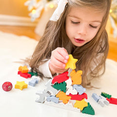 HABA Animal Upon Animal Christmas sleds, reindeer, and squirrels invite dexterity
