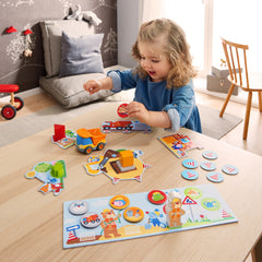 HABA cooperative-building scene with kids promotes shared problem-solving.