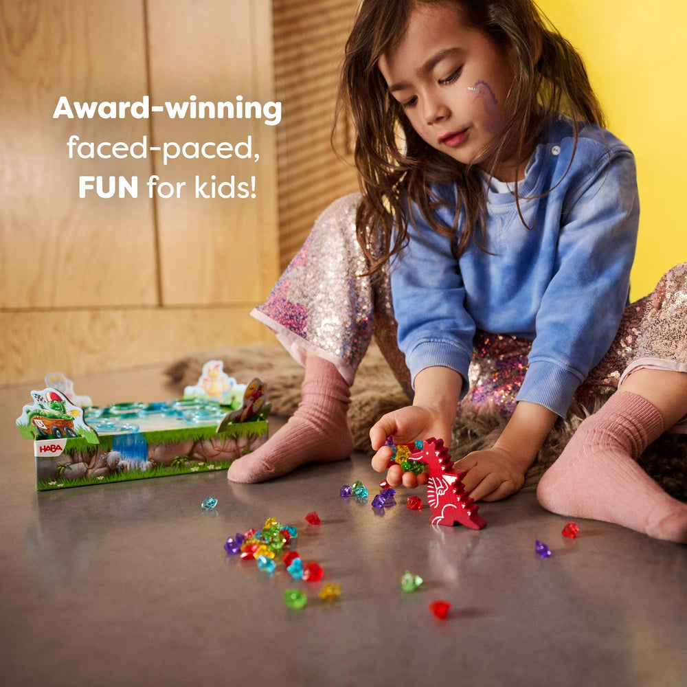 HABA Dragon's Breath components sparkle with colorful tokens and cards.