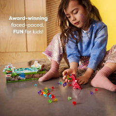 HABA Dragon's Breath components sparkle with colorful tokens and cards.