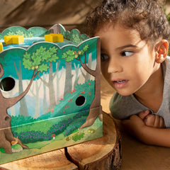 HABA Peepholes invite kids to peek and guess hidden animals.
