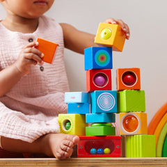 HABA Fun with Sounds blocks closeup reveals textured beech wood and safe finish.
