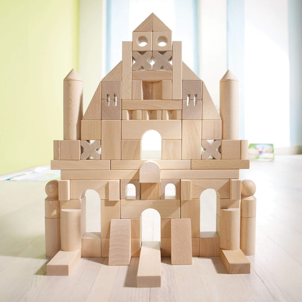 Smooth edges and natural finish on HABA blocks for safe toddler play.