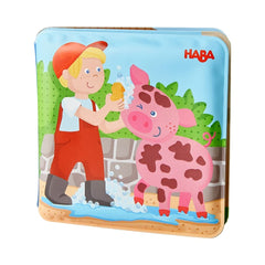 HABA Magic Color Changing Bath Book reveals animals under water, enhancing bath time.