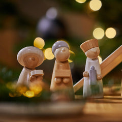 HABA Baby Jesus in wooden manger for core nativity theme.
