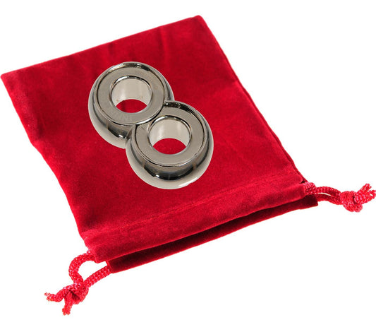 Hanayama Infinity puzzle with chrome figure-eight design for stylish desk display.