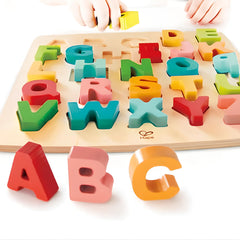 Hape Alphabet Blocks board with cutouts enhances letter matching and spatial skills