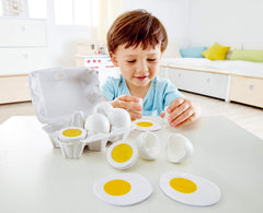 Hape eggs revealed after peeling, showing yolk and white