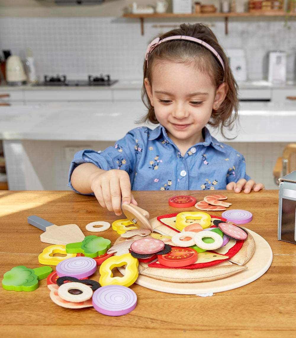 Hape Pizza Cutter ensures safe, smooth slicing during playtime.