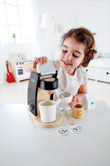 Hape spoons, milk, and sugar bowl complete pretend coffee rituals.