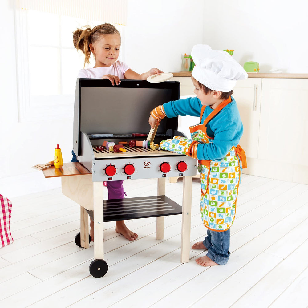 Hape wooden play food skewers encourage pretend cooking and sharing.