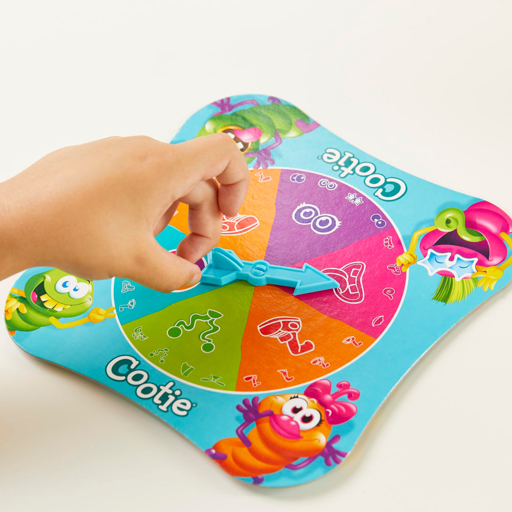 Hasbro Gaming Cootie colorful pieces inspire imaginative bug creation.