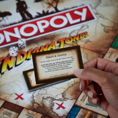 Hasbro Gaming Monopoly Indiana Jones Edition artifact-golden-idol token highlights treasure-hunting excitement.