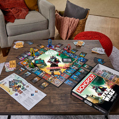 Hasbro Gaming Monopoly Star Wars Boba Fett Edition dice and card components for play.
