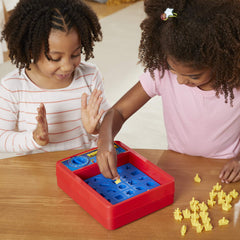 Colorful Hasbro Perfection shapes for shape recognition practice