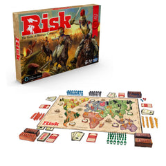 Hasbro Gaming Risk dragon token beside the board, adding epic battles and tactical options.