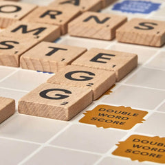 Hasbro Scrabble game night setup in a cozy family room setting