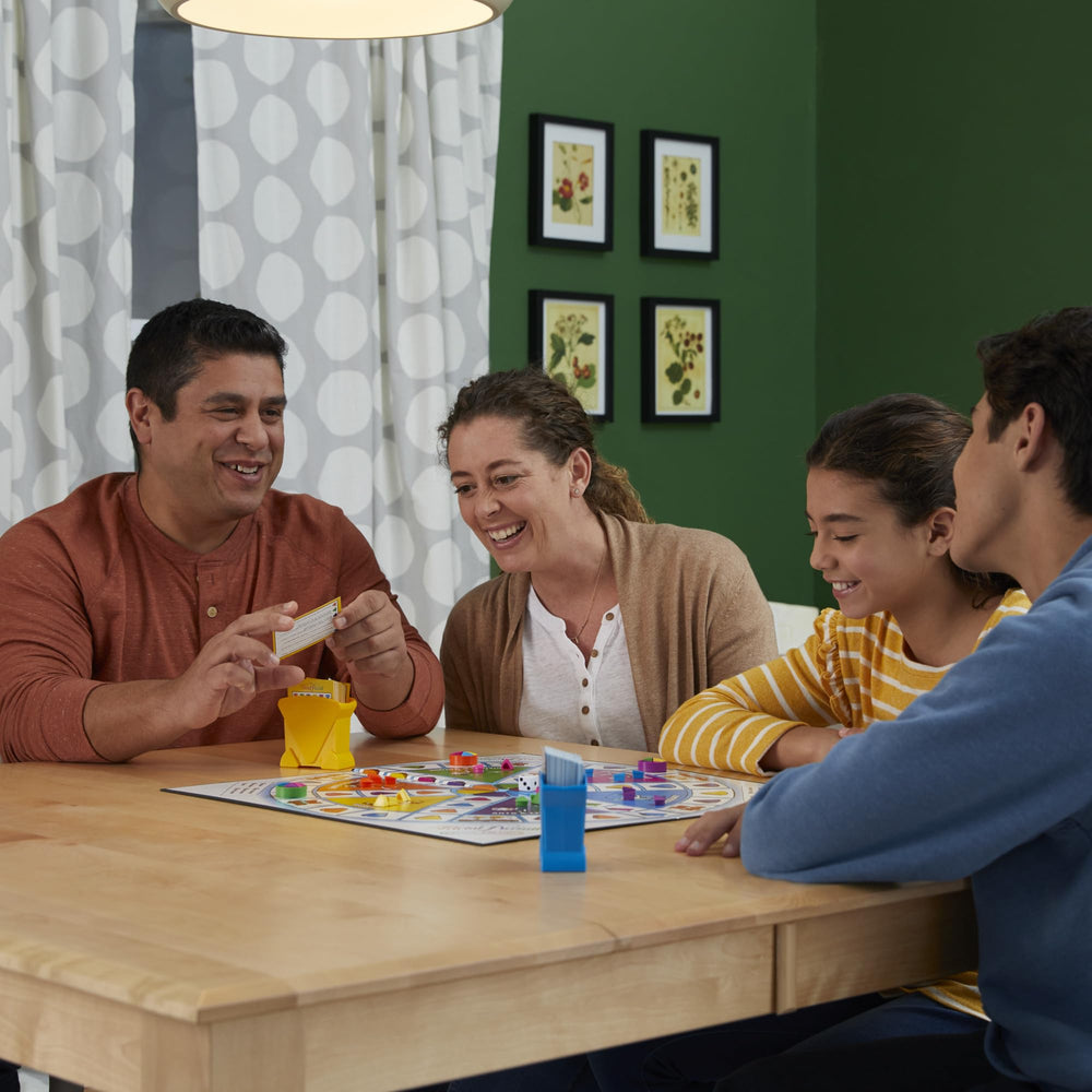 Hasbro Gaming Trivial Pursuit Family Edition six movers in action with teams