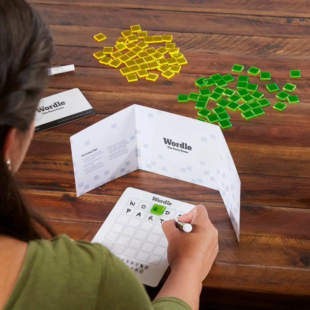 Hasbro Wordle: The Party Game 5-letter Secret Word written by the host into play.