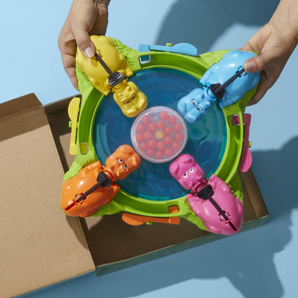 Hasbro Hungry Hungry Hippos instant-marble reload keeps the game flowing between rounds.