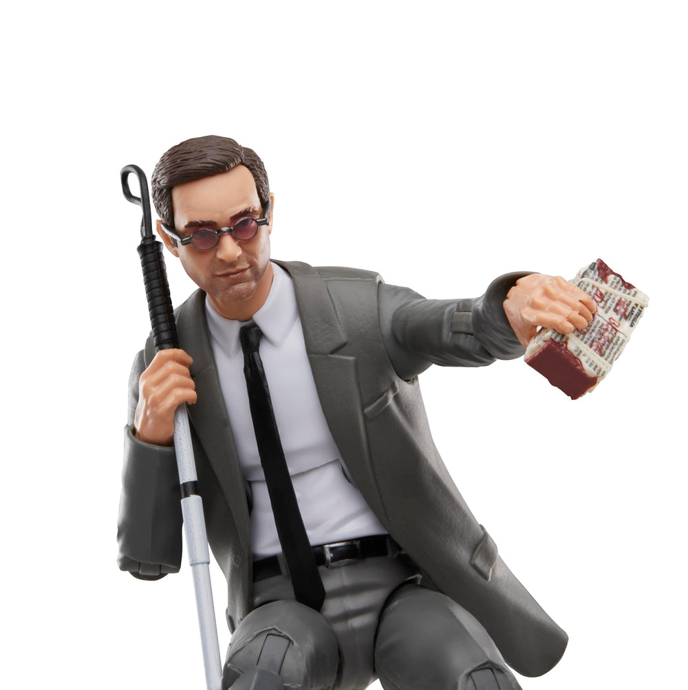 Hasbro Matt Murdock figure with two accessories, including brick, for scene reenactments.