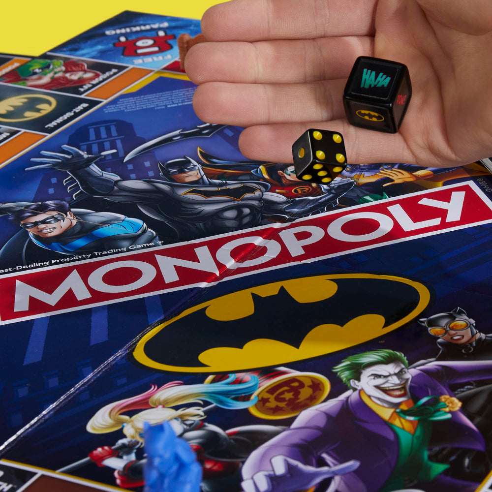 Hasbro Monopoly Batman Edition shows Batarangs used as currency for gameplay