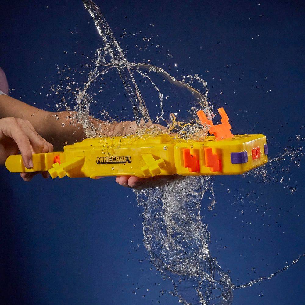 Hasbro Nerf Super Soaker Minecraft Axolotl Blaster being filled with move-fill handle