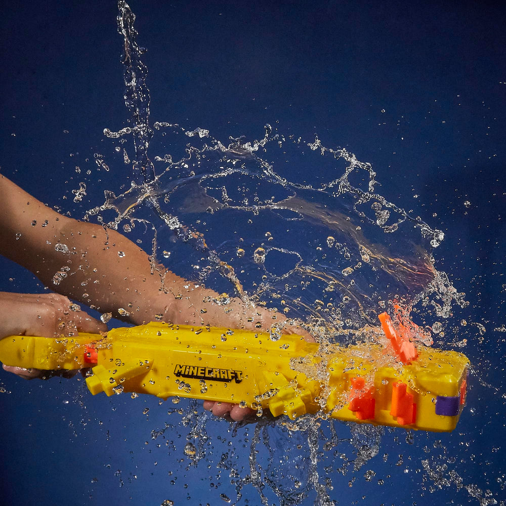 Hasbro Nerf Super Soaker Minecraft Axolotl Blaster outdoors for kids' play