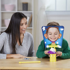 Hasbro Pie Face Game handles anchored to stabilize during fast rounds.