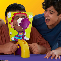 Hasbro Pie Face players laughing during a turn