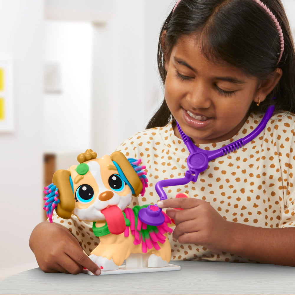 Hasbro Play-Doh Care 'n Carry Vet Playset hair styling tools for pups.