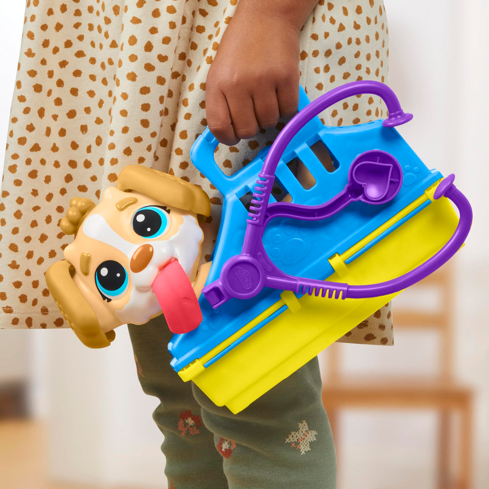 Hasbro Play-Doh Care 'n Carry Vet Playset safety scissors for haircuts.