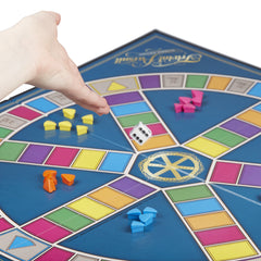 Hasbro Trivial Pursuit wedges showing color-coded category edges for scoring.