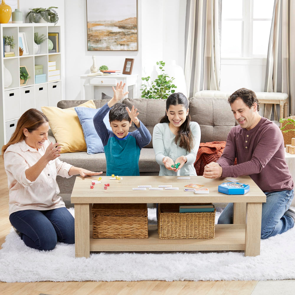 Family gathered around for a quick round of Yahtzee Frenzy