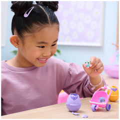 Hatchimals Alive bottle and pacifiers included for nurturing care.