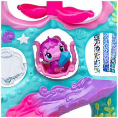 Hatchimals Coral Castle Mermal pool showcases color-change fun in warm water.