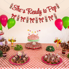 Hemicha gender reveal baby shower decor suits red color palette beautifully.