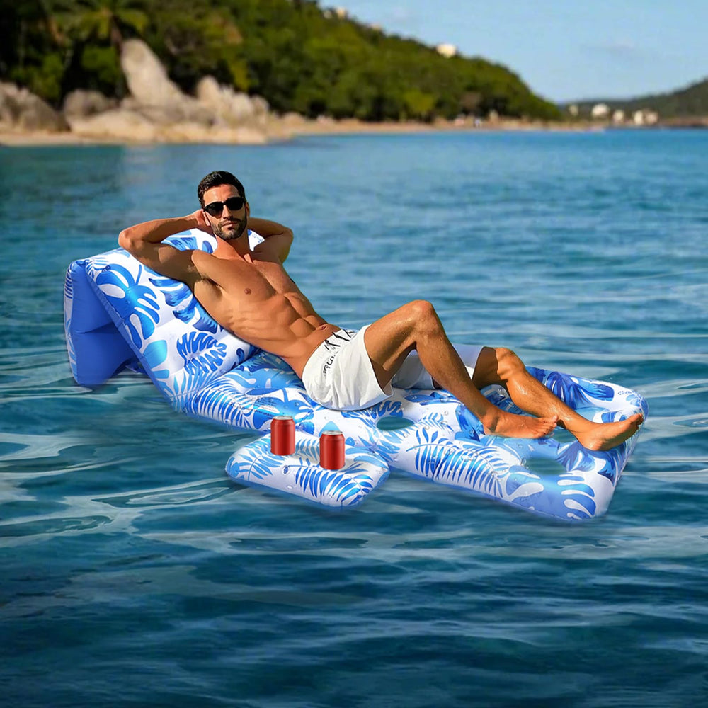 HeySplash pool lounger blue palm leaf pattern adds tropical style.