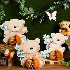Hiboom bear honeycomb centerpiece with greenery accents on display