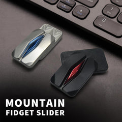 HIDEDC Mountain Fidget Slider in-hand demonstrates pocket-sized portability for on-the-go focus.