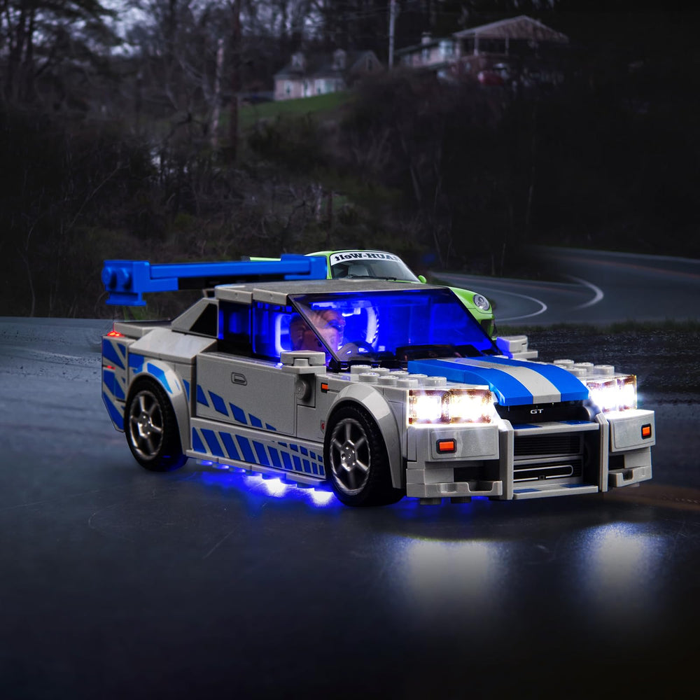 Hilighting LED light kit on Nissan Skyline R34 model, showcasing vibrant illumination.