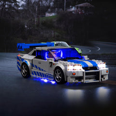 Hilighting LED light kit on Nissan Skyline R34 model, showcasing vibrant illumination.
