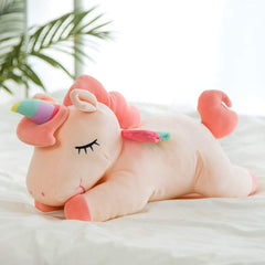 Hitoshe unicorn plush with rainbow wings adding playful decor and comfort