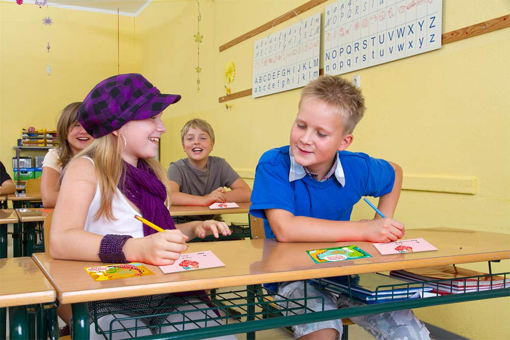 Kids exchanging Hohomark valentines in a classroom