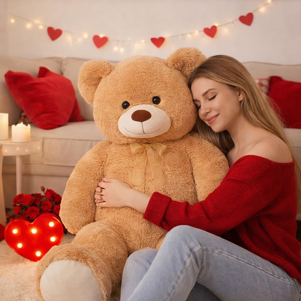 Close-up of securely stitched eyes and ribbon bow on HollyHOME bear