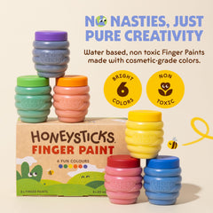 Close-up of Honeysticks paint on skin highlighting easy cleanup after play.